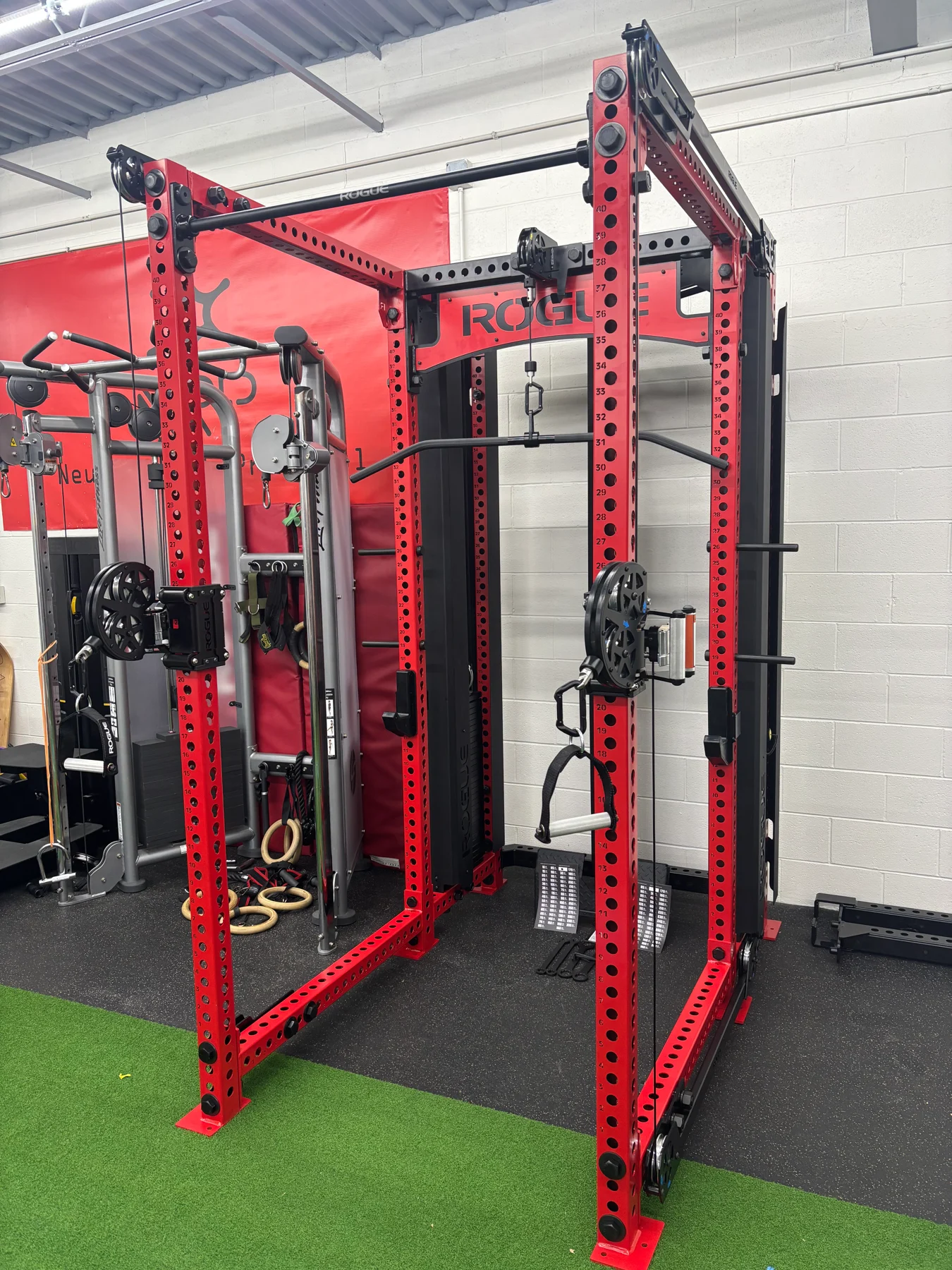 After assembly: an angled view showing the rack frame, pulley assemblies, cable attachments, and base layout.